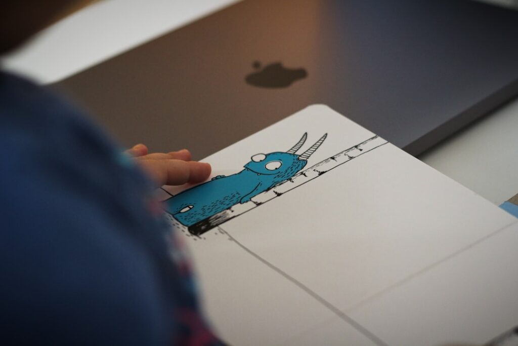 Muse Spark - person holding blue and white car drawing